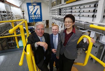 UMass Lowell Chancellor Marty Meehan, Strategic Marketing Innovations Chief Operating Officer Bill McCann, and Vice Provost Julie Chen stood in a laboratory at the universit’s Saab Center. Boston Globe photo by Cheryl Senter